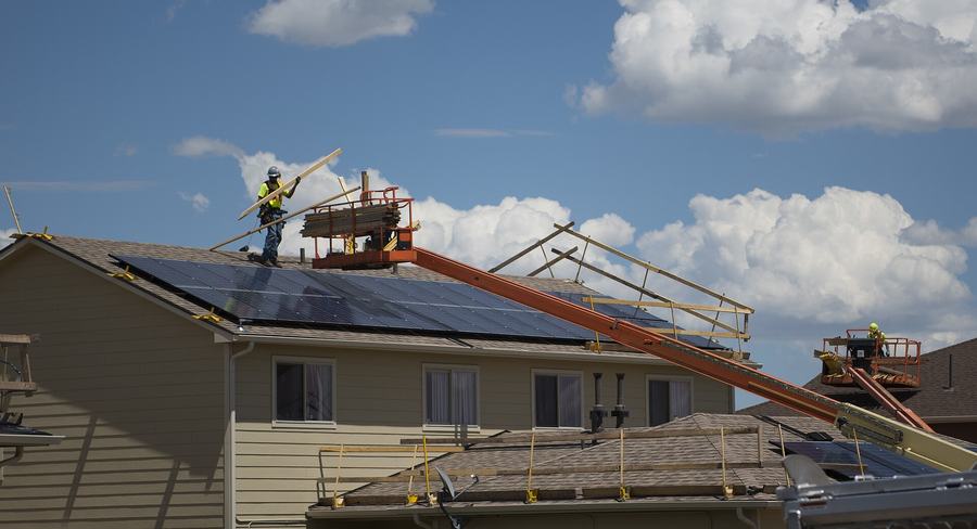 A roofing crew at work
